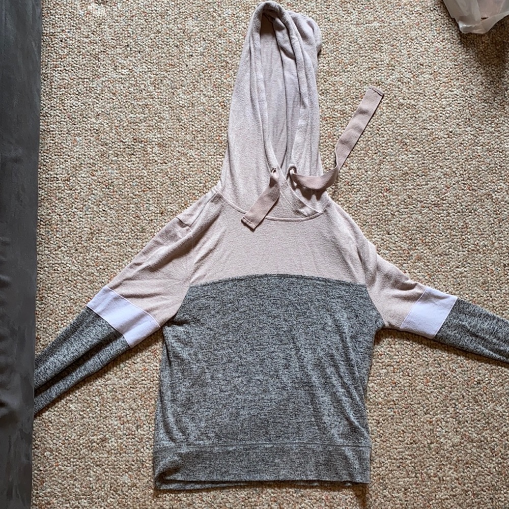 Long sleeve shirt with hood.